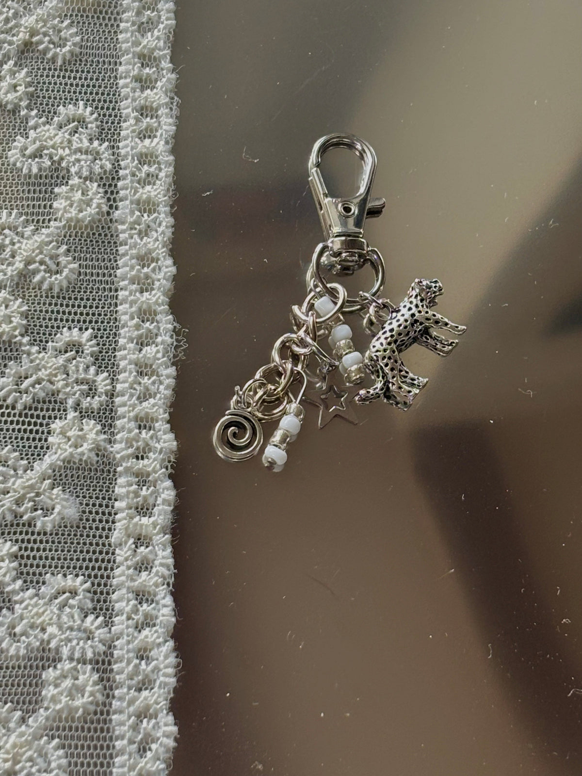 silver leo keychain