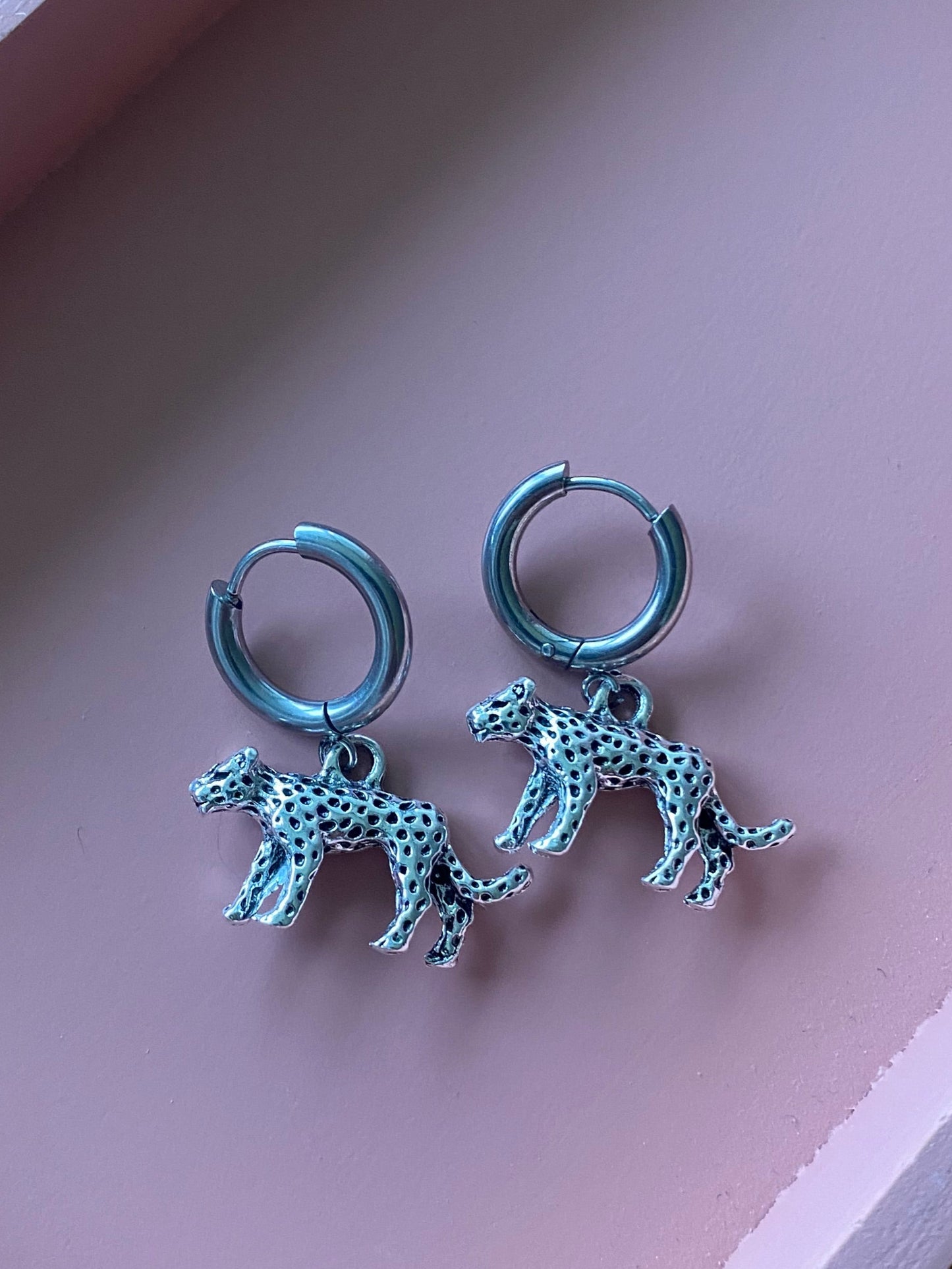 silver leo earrings